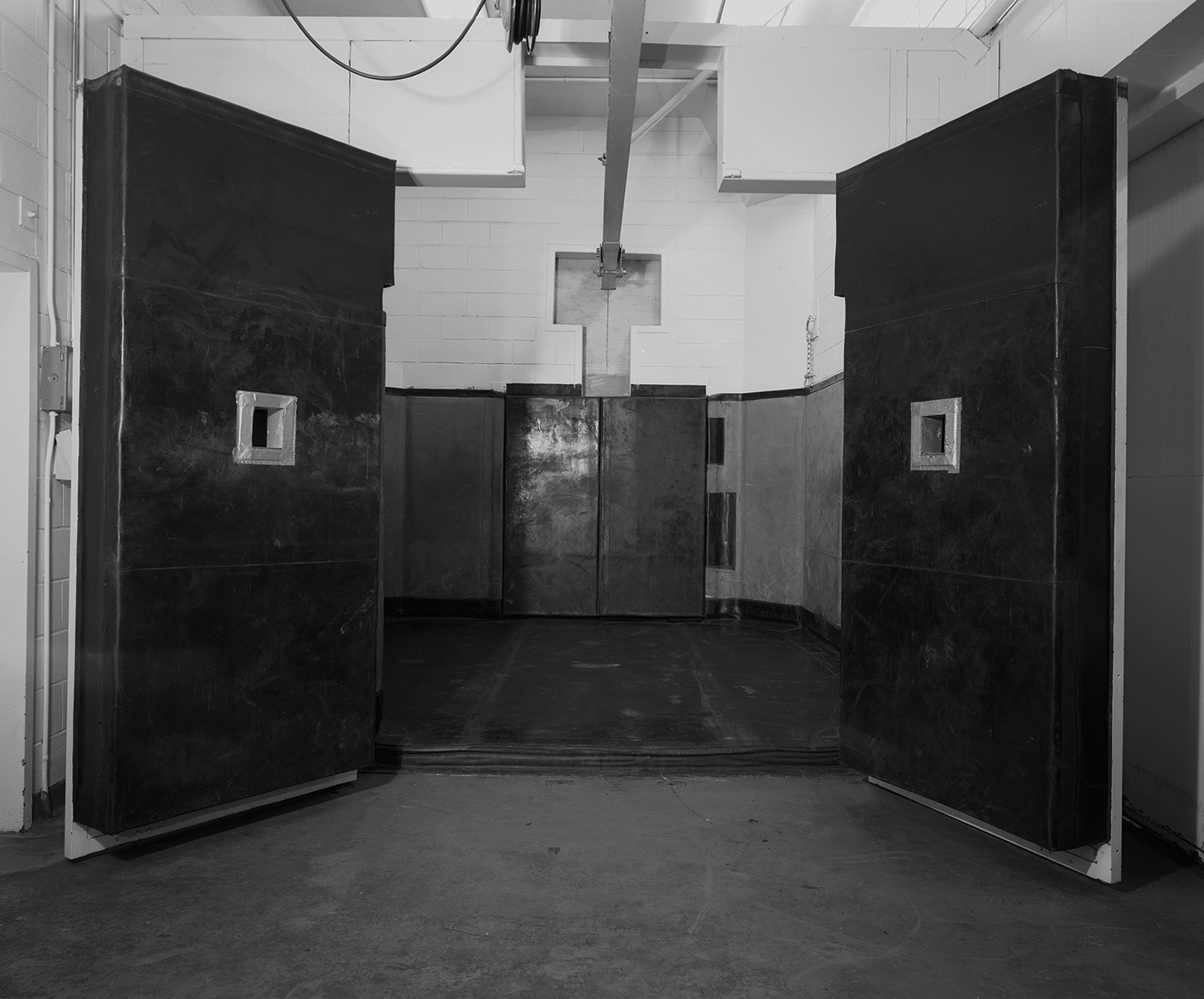 Lynne Cohen / Estate  - Untitled (black doors Malevich), 2004